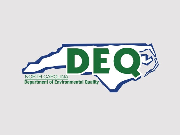Logo of North Carolina Department of Environmental Quality (DEQ) with DEQ in large green letters over a blue outline of North Carolina state.