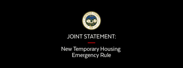 Black background with the Haywood County, NC seal above the text: JOINT STATEMENT: New Temporary Housing Emergency Rule.
