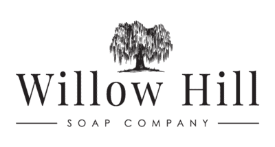 Logo for Willow Hill Soap Company with a detailed illustration of a willow tree above the company name in elegant black capital letters on a light background.