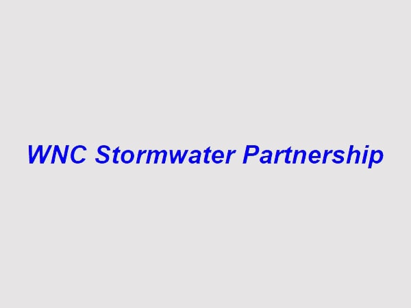 Blue text reading WNC Stormwater Partnership is centered on a light gray background.
